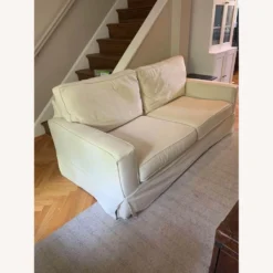 PB Comfort Square Arm Slipcovered Sofa + Ottoman