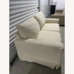 PB Comfort Square Arm Slipcovered Sofa + Ottoman -Pottery Barn 1500 1500 frame 0 1892